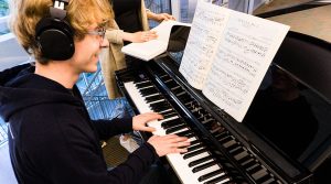 Calling all music lovers: five pianos in library locations across campus are waiting to be played